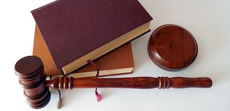 gavel and books on table